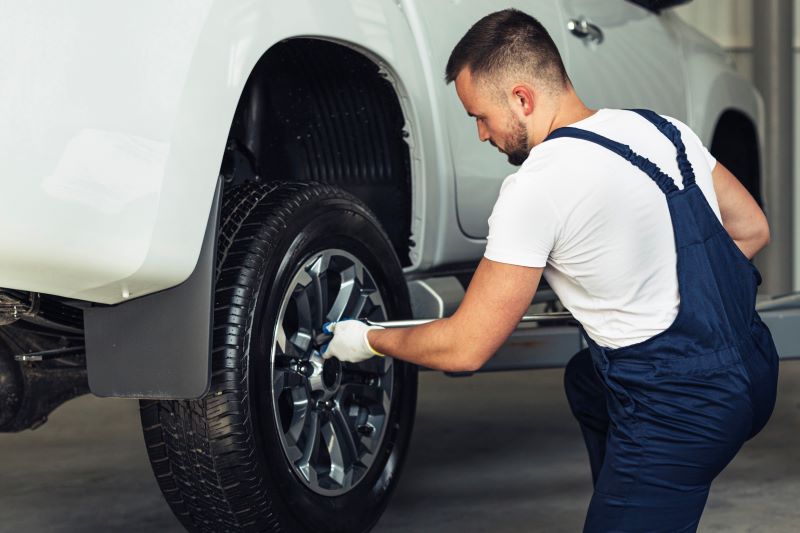 front-view-male-mechanic-working.jpg front-view-male-mechanic-working.jpg